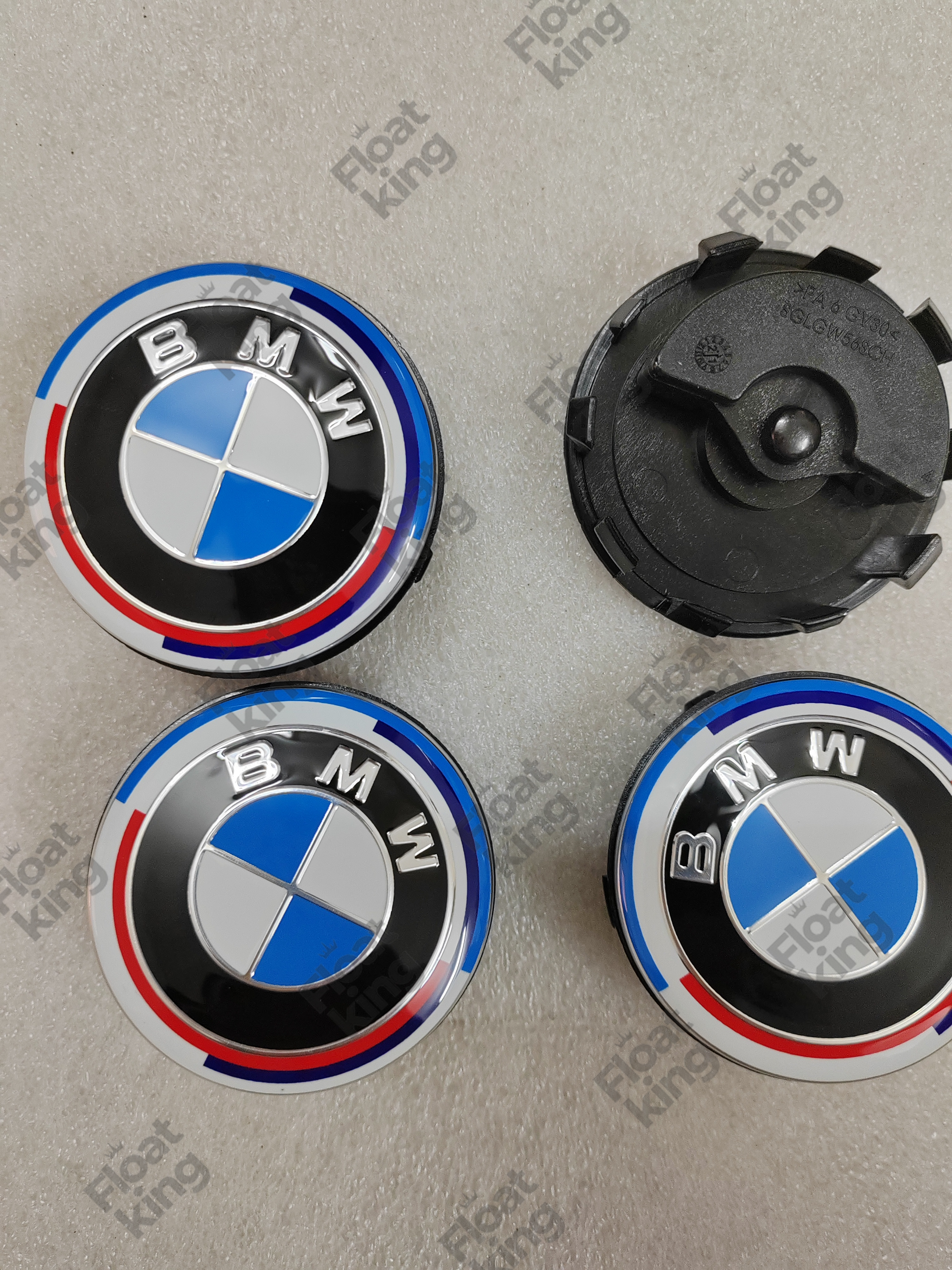 BMW 50th Anniversary Floating Center Caps - 3 Caps front 1 Cap Back